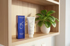ZO Skin Health Hydrating Cleanser 6.7oz on upscale clinical spa wood shelving with indoor houseplant representing purity and hydration