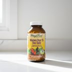 Multivitamin amber glass supplement bottle in soft natural window light on white quartz countertop – More4less Outlet