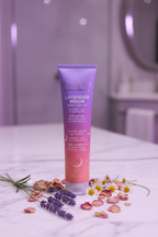 Pacifica Lavender Moon Body Lotion on marble surface with lavender sprigs rose petals and chamomile flowers