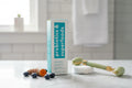 TULA Cult Classic cleanser on marble vanity with blueberries and turmeric lifestyle