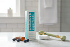 TULA Cult Classic cleanser on marble vanity with blueberries and turmeric lifestyle