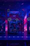 Masters of the Universe Origins Leech action figure in blister card on dark collector shelf with dramatic cosmic space lighting — More4less Outlet