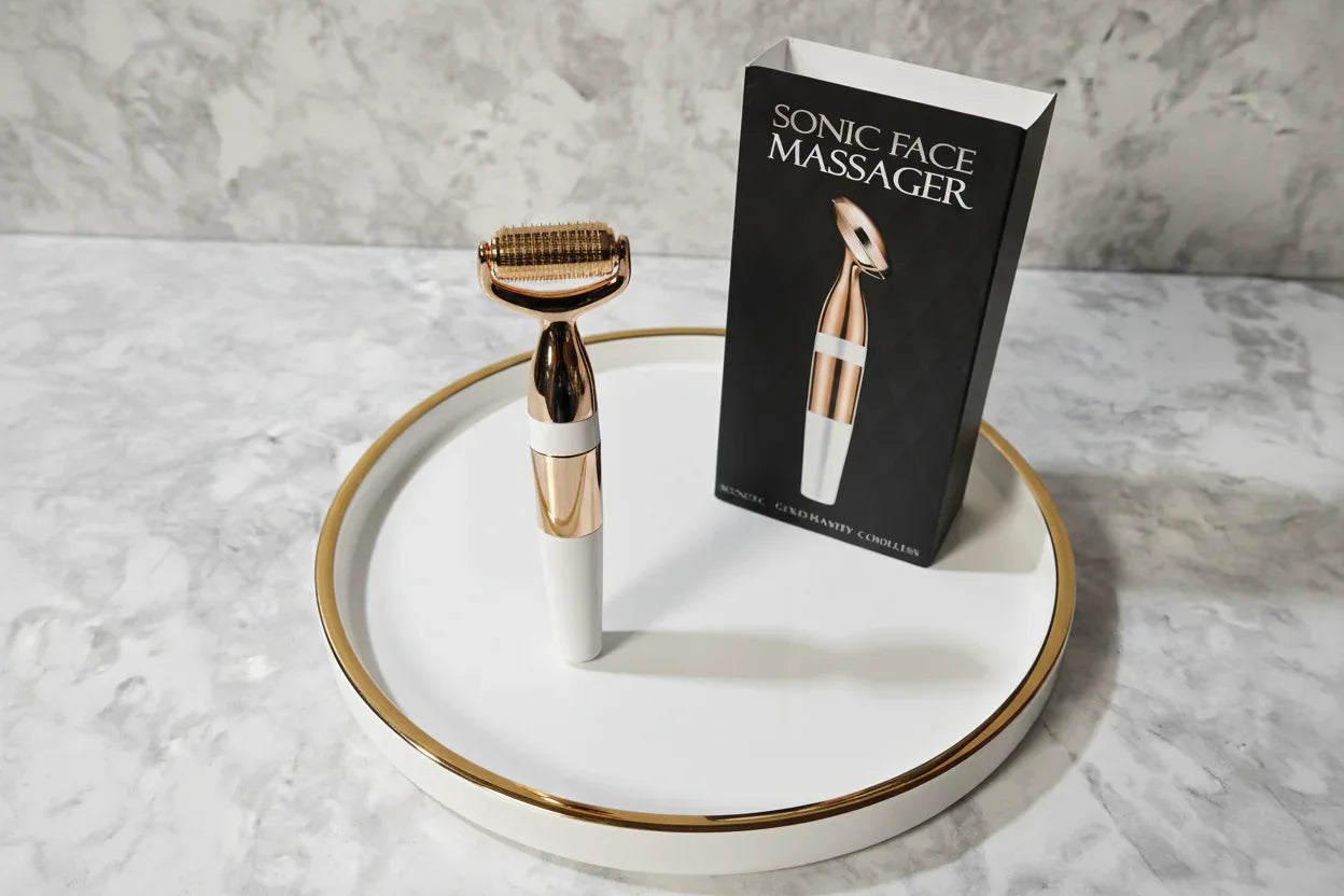 Organized skincare display on a white ceramic tray with gold accents featuring the Galahome Sonic Face Massager