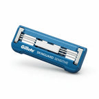 Gillette SkinGuard Sensitive blade cartridge close-up hero shot showing twin blade and SkinGuard bridge