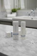 Rodan + Fields REDEFINE Pore Refining Toner bottle and box centered on light marble vanity