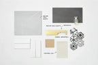 Professional interior design mood board featuring brushed gold metallic faucet hardware accents