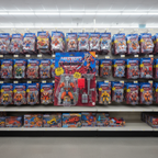 Masters of the Universe Origins Snout Spout blister card hanging on a retail toy store peg hook among other MOTU figures — More4less Outlet