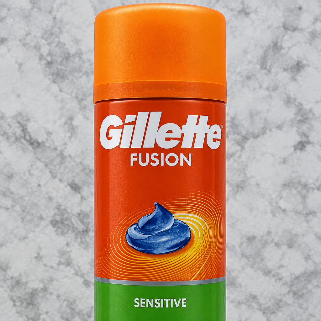 Close view of orange Gillette Fusion Sensitive can front label
