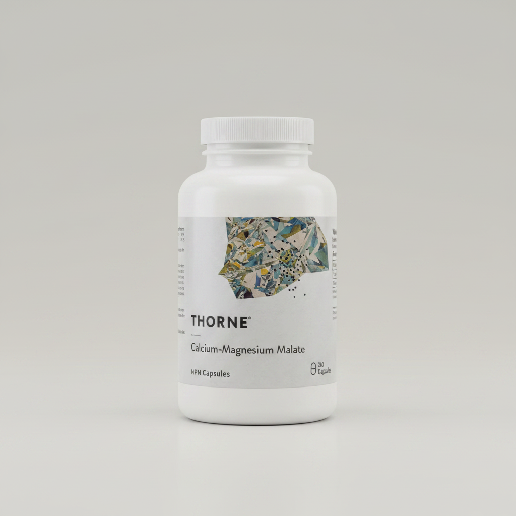 Thorne Calcium-Magnesium Malate bottle on neutral studio background