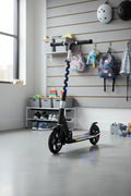 Jetson Jupiter Jumbo kick scooter in organized modern home storage space with bright lighting
