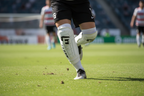 G-Form Pro-S Vento Shin Guards Large worn by soccer player on grass field during match