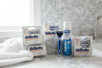 Gillette SkinGuard Sensitive blade refills on marble bathroom counter with razor handle lifestyle