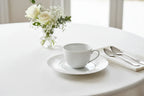Bernardaud Organza saucer on elegant breakfast table setting lifestyle