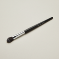 Mary Kay Eye Crease Brush on a neutral studio surface