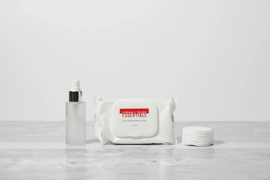 Professional studio setting with makeup remover wipes pack on neutral surface, minimalist beauty product photography