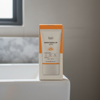AI-generated lifestyle image of Dr.G Brightening Up Sun+ SPF50+ PA+++ 50 mL retail box beside a white sink