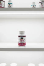 MaryRuth's Biotin Gummies bottle on bright minimalist wellness pantry shelf white lighting