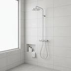 Minimalist spa-like bath area showing Hansgrohe polished chrome shower arm fittings on white tile wall