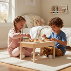 Two children sitting on a bedroom floor arranging tiny miniature food items on a small play surface