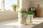 Herbalife Formula 1 French Vanilla canister on a clean morning kitchen counter with natural sunlight and shaker bottle