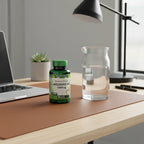 Nature's Truth L-Arginine HCl 1000mg bottle on modern office desk with leather desk mat and glass water carafe