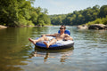 Intex River Run 1 Lounge man relaxing floating on calm sunny river trees rocks background