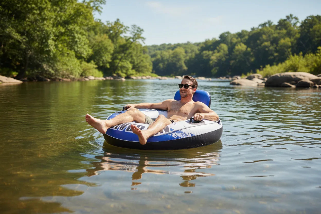 Intex River Run 1 Lounge man relaxing floating on calm sunny river trees rocks background