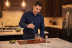 Man using Houdini 4-Piece Cocktail Tool Set to stir a cocktail in home kitchen - More4less Outlet
