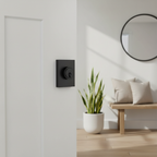 Kwikset square iron black deadbolt lock on white painted front door with clean minimal home entryway – More4less Outlet