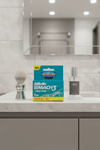Gillette Mach3 Fresh Clean 4-pack on slate gray bathroom vanity with silver shave brush and glass aftershave bottle