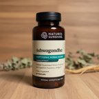 Nature's Sunshine Ashwagandha Herbal Blend bottle on a natural wood surface with botanical styling