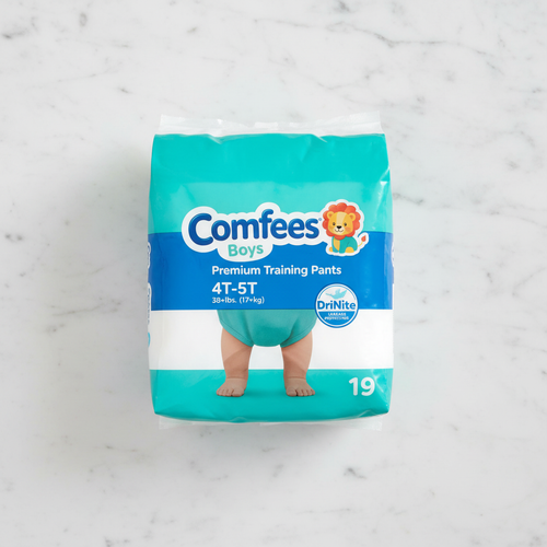 Front-facing studio shot of teal Comfees Boys Premium Training Pants 4T-5T packaging on bright marble countertop