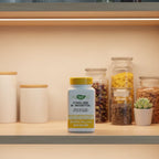 Nature's Way Choline and Inositol bottle inside clean modern health supplement pantry with soft ambient lighting and high-transparency apothecary jars