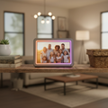 PhotoShare MyLuma 7 inch WiFi smart digital photo frame stardust grey displaying family photo on living room shelf with warm RGB LED ambient glow