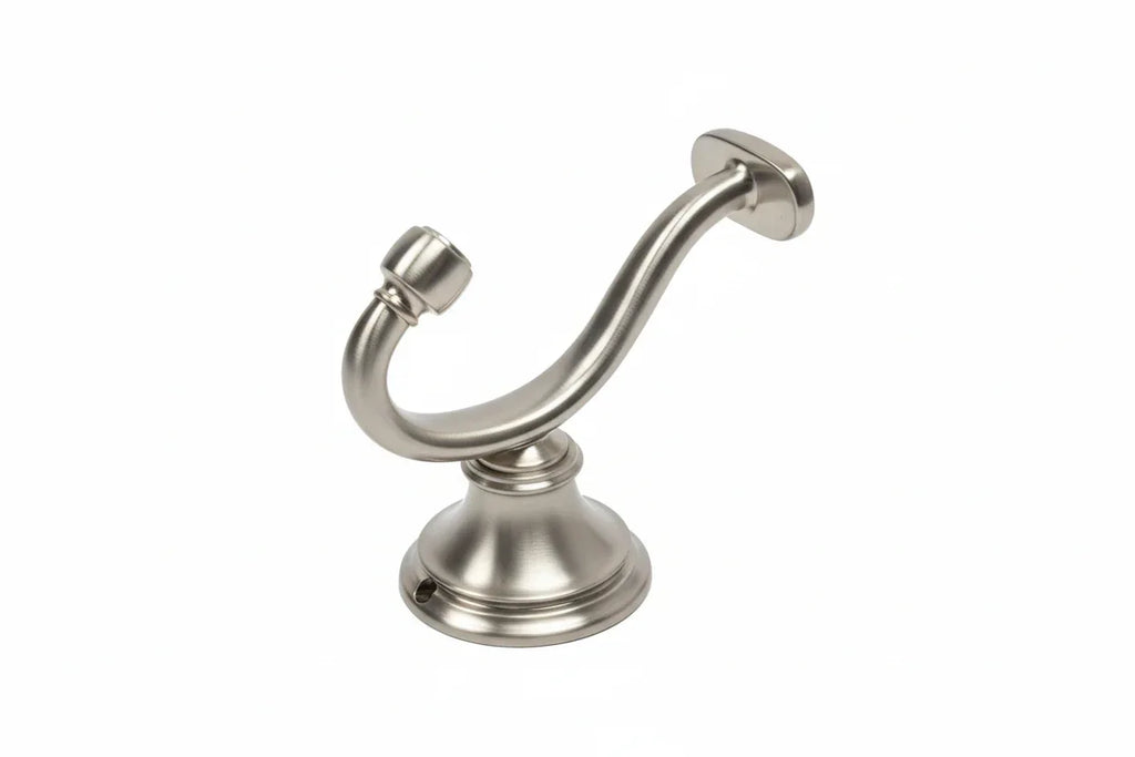 Studio high-key tabletop photo focusing on the texture of brushed nickel bathroom robe hook