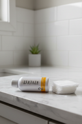 Rodan + Fields REVERSE Intensive Brightening Toner bottle on bathroom vanity beside cotton gauze pads
