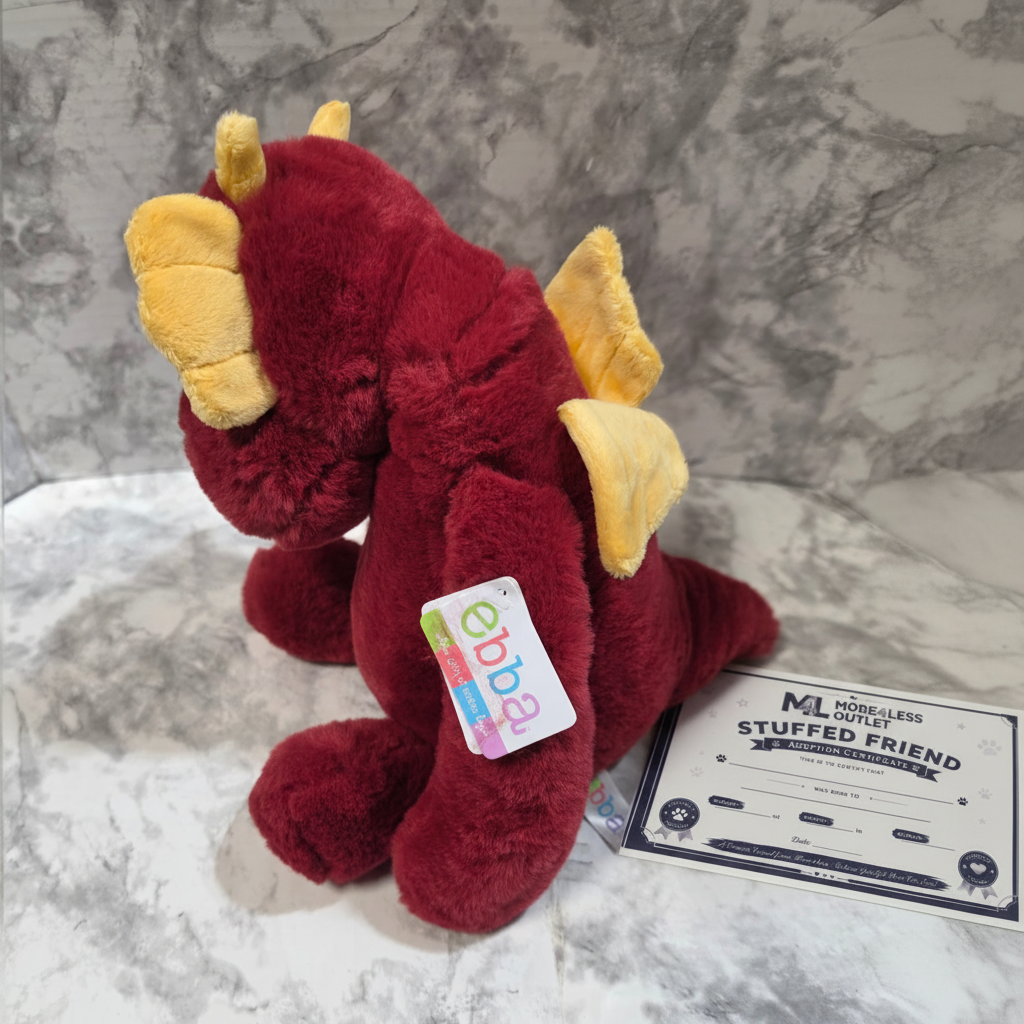 Ebba Red Dragon Plush next to More4less Outlet Stuffed Friend Adoption Certificate gift flat lay - More4less Outlet