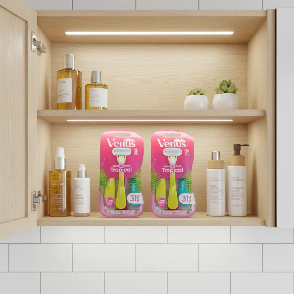 Gillette Venus Tropical Disposable Razors 6ct Bundle in organized bathroom cabinet with glass skin care bottles