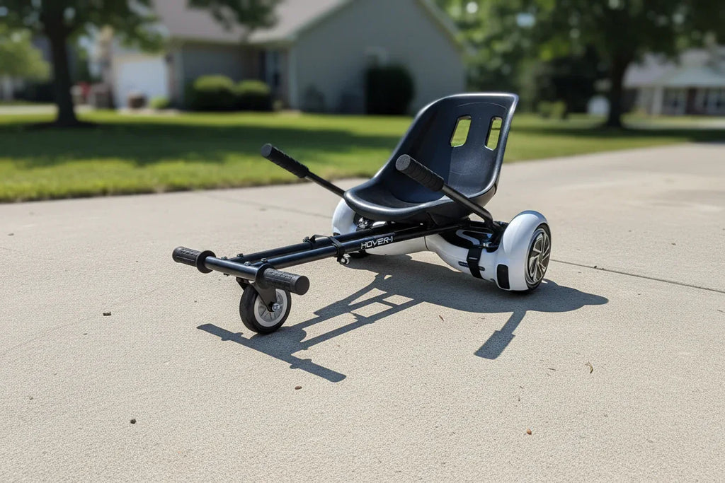 Hover-1 Buggy go-kart attachment connected to a self-balancing scooter on a sunlit outdoor concrete driveway