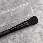AI close detail of Mary Kay All-Over Eye Shadow Brush bristles and frosted sleeve