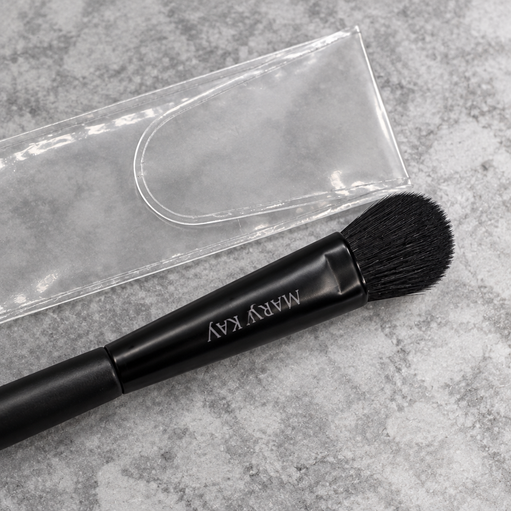AI close detail of Mary Kay All-Over Eye Shadow Brush bristles and frosted sleeve