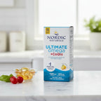 Professional lifestyle arrangement of high-potency cardiovascular supplement box on clean white marble surface