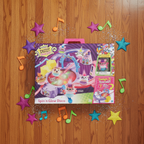 FurReal Friends Dizzy Dancers Spin n Glow Disco playset by Hasbro on a glossy hardwood floor with dance-themed star and glitter props – More4less Outlet