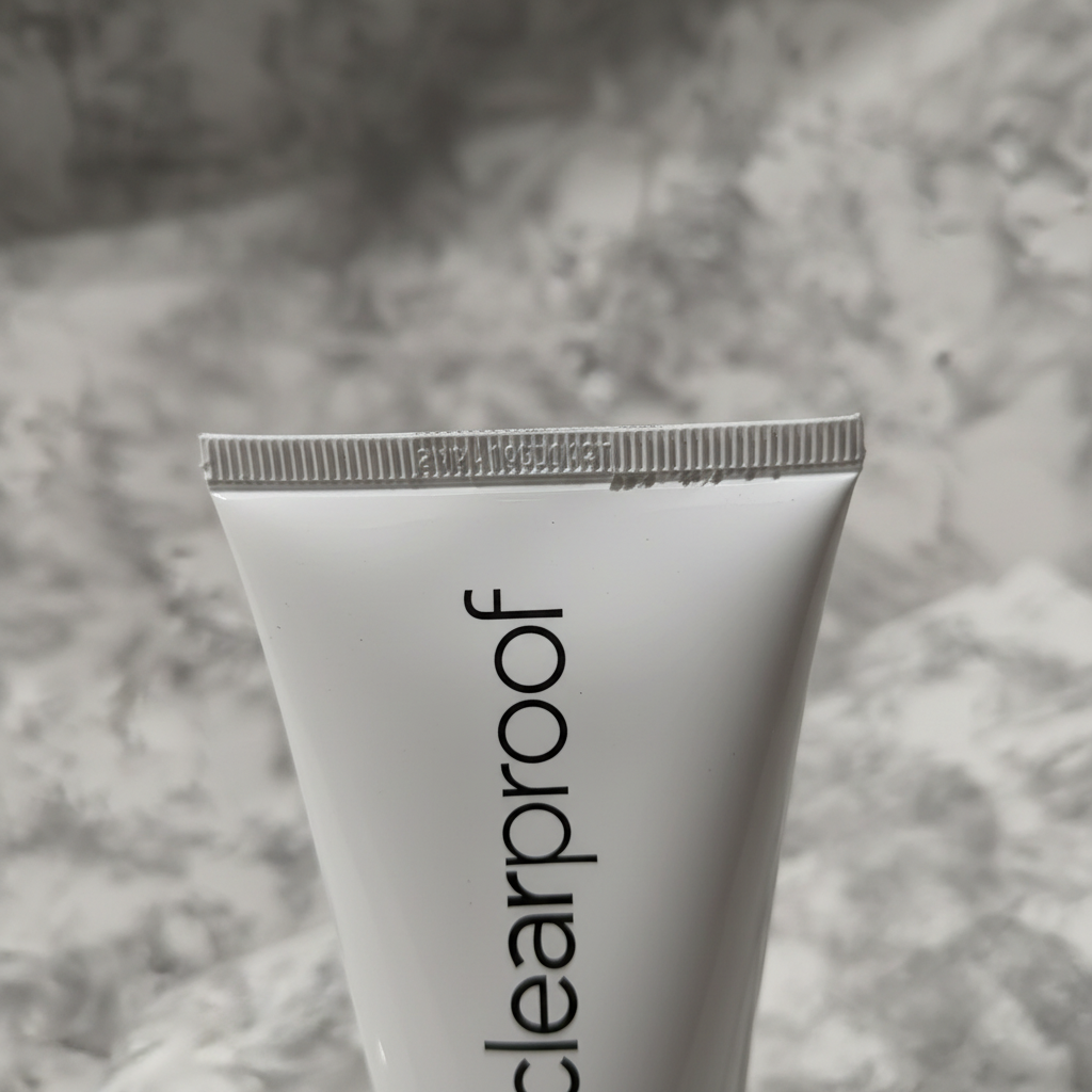 Close-up of trimmed top crimp of Mary Kay Clear Proof Clarifying Cleansing Gel tube showing clean edge