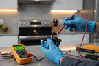 Professional multimeter testing electrical range control switch components in modern kitchen