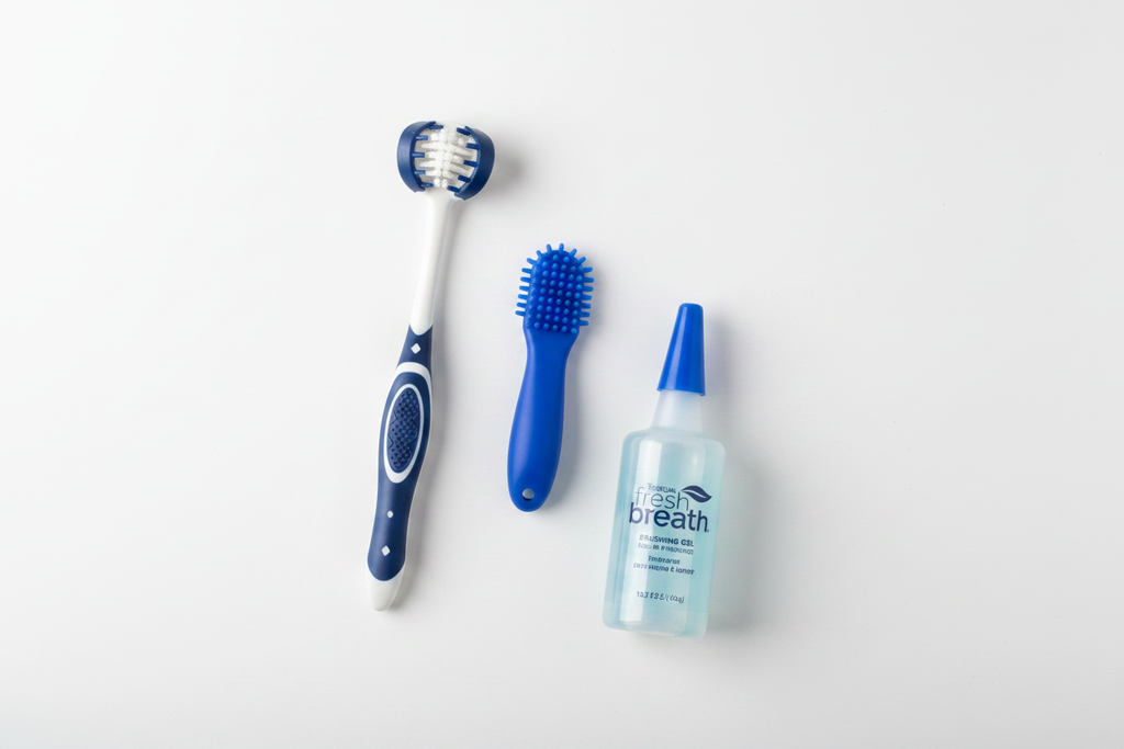 TropiClean Fresh Breath Oral Care Kit flat lay — TripleFlex toothbrush fingertip brush and brushing gel for large dogs dental care