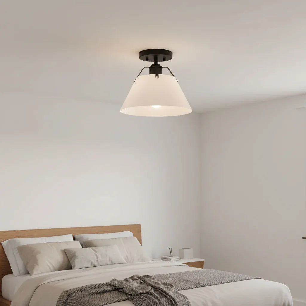 Avec Avery semi-flush mount matte black white shade installed in modern bedroom