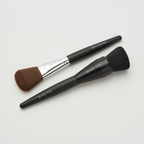 Mary Kay liquid foundation brushes showing Flat Paddle and Angled Buffing styles
