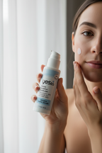 Yes To Intense Hydration Moisturizer being applied to face in natural window light lifestyle photo.