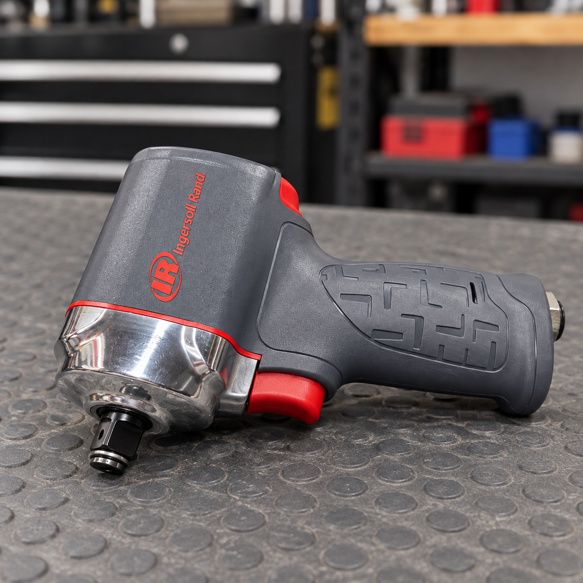 Ingersoll Rand 35MAX 1/2-Inch Ultra-Compact Air Impact Wrench in a rubber workbench mat, AI-generated lifestyle illustration.